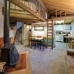 Living and stairs to loft